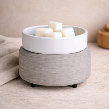 Load image into Gallery viewer, 2-in-1 wax warmer in mineral grey textured stone finish with removable white dish and wax melts on neutral surface