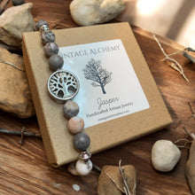 Load image into Gallery viewer, Jasper essential oil bracelet with tree charm sitting on gift box