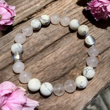 Load image into Gallery viewer, Rose quartz and howlite stretch bracelet with sunburst charm