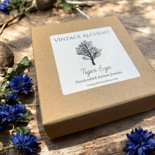 Load image into Gallery viewer, box for yellow and blue tiger eye stretch bracelet with flower charms