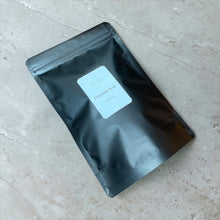 Load image into Gallery viewer, coconut noir herbal tea in studio tin refill pouch