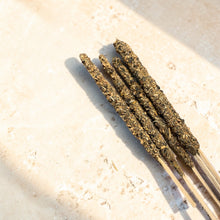 Load image into Gallery viewer, Country Cottage herbal incense sticks on natural limestone surface with textured botanical coating