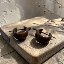 Load image into Gallery viewer, dark wood hoop earrings with stick post on rustic wood board boho artisan wooden jewelry
