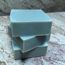 Load image into Gallery viewer, Vintage Alchemy Earl Grey cold process soap bars stacked on natural stone surface showing smooth sage green soap texture