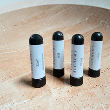 Load image into Gallery viewer, Essential oil inhalers collection on warm limestone surface with soft natural light