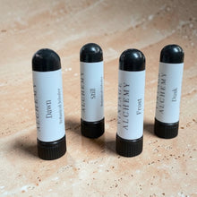 Load image into Gallery viewer, Essential oil inhalers collection on warm limestone surface with soft natural light