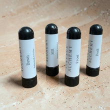 Load image into Gallery viewer, Essential oil inhalers collection on warm limestone surface with soft natural light
