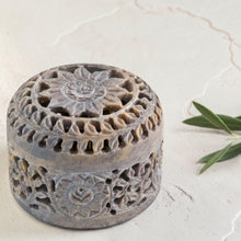 Load image into Gallery viewer, carved lotus stone incense burner with decorative lid on neutral limewashed plaster background