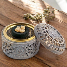 Load image into Gallery viewer, Lotus stone incense burner with removable brass screen holding charcoal disc and resin