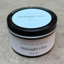 Load image into Gallery viewer, Tin of Vintage Alchemy Midnight Glen Black Tea on a concrete surface