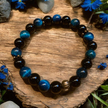 Load image into Gallery viewer, onyx and blue tiger eye stretch bracelet with bronze spacers