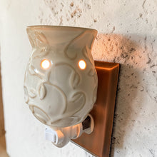 Load image into Gallery viewer, white ceramic plug in wax warmer with raised vine pattern night light