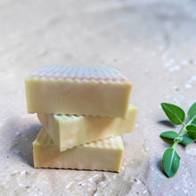 Load image into Gallery viewer, Stacked bars of Pomona apple sage glycerin soap with fresh sage leaves on a stone surface