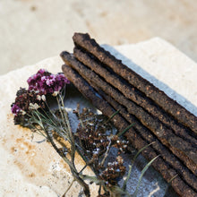 Load image into Gallery viewer, Rustic Myrrh herb and resin incense sticks with dried botanicals on pale stone surface