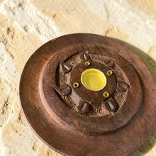 Load image into Gallery viewer, Hand carved sheesam wood incense burner with brass center holder on warm natural mineral surface