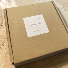 Load image into Gallery viewer, Sheesam wood incense dish packaged in kraft box with Vintage Alchemy label on warm mineral surface