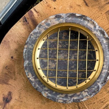 Load image into Gallery viewer, Top view of carved stone incense burner with brass screen for resin and charcoal incense