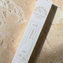 Load image into Gallery viewer, Vanilla bamboo incense sticks by Herb & Earth on textured limestone surface