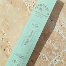 Load image into Gallery viewer, White sage bamboo incense sticks by Herb & Earth on warm mineral surface