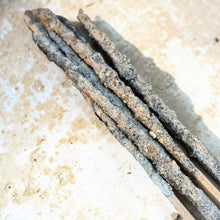 Load image into Gallery viewer, White Yagra natural incense sticks made with resin and herbs on neutral stone background
