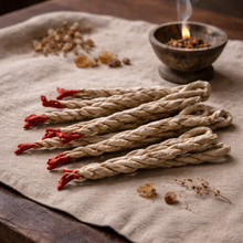 Load image into Gallery viewer, Hand-twisted botanical rope incense bundles styled on linen with resin and wood elements