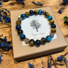 Load image into Gallery viewer, yellow and blue tiger eye stretch bracelet with flower charms