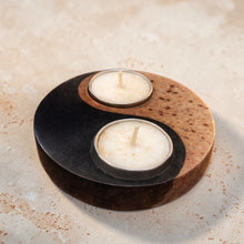 Load image into Gallery viewer, Yin and yang candle holder with two candles on a wooden surface