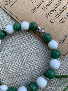 jade beaded bracelet with turtle charm
