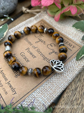 Load image into Gallery viewer, tiger eye bracelet with lotus charm
