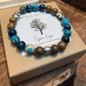 Blue stretch bracelet sitting on gift box