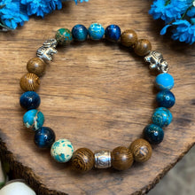 Load image into Gallery viewer, Blue tiger eye stretch bracelet with elephant charms
