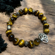 Load image into Gallery viewer, Gold tiger eye bracelet with lotus charm
