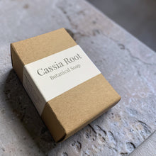 Load image into Gallery viewer, Cassia Root botanical soap in kraft box packaging on natural stone surface handcrafted soap by Vintage Alchemy
