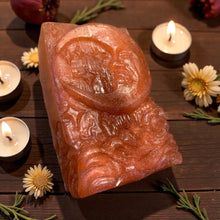 Load image into Gallery viewer, Decorative soap with intricate moon design on a wooden surface with candles and flowers.
