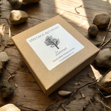 Load image into Gallery viewer, gift box for garnet stretch bracelet sitting on wood table
