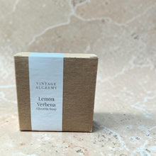 Load image into Gallery viewer, boxed glycerin soap lemon verbena citrus soap in kraft packaging with minimal label on neutral limestone background
