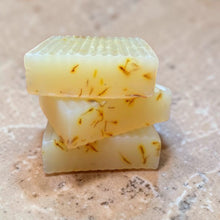 Load image into Gallery viewer, stacked glycerin soap bars grapefruit citrus blend with safflower petals on limestone background
