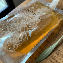 Load image into Gallery viewer, herb-and-air-liquid-castile-soap-refill-pouch-natural-light
