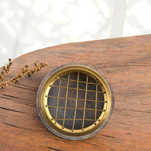 Load image into Gallery viewer, Top view of lotus stone incense burner with removable brass screen for charcoal and botanicals
