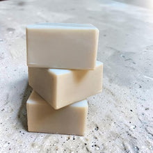 Load image into Gallery viewer, Stacked bars of Sprig solid dish soap with pumice on a light stone surface. Lavender, rosemary, and sage scented dish soap handcrafted by Vintage Alchemy.
