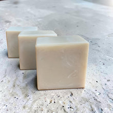 Load image into Gallery viewer, Three bars of Sprig solid dish soap with pumice on a light stone surface. Lavender, rosemary, and sage scented dish soap handcrafted by Vintage Alchemy.
