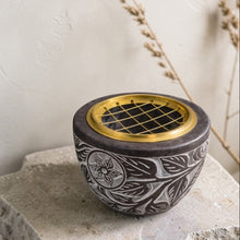 Load image into Gallery viewer, carved stone incense burner bowl with brass charcoal grate on natural stone surface
