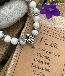 essential oil bracelet with howlite and lotus charm